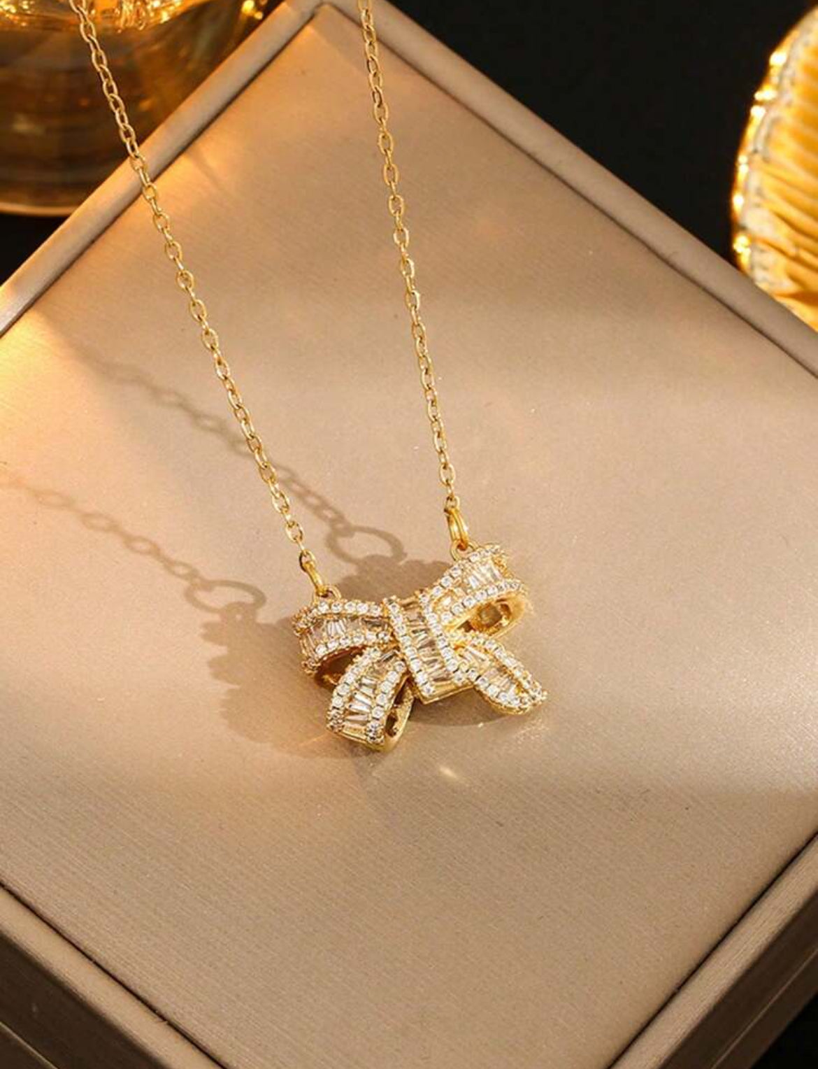 Gael stainless steel bow tie necklace